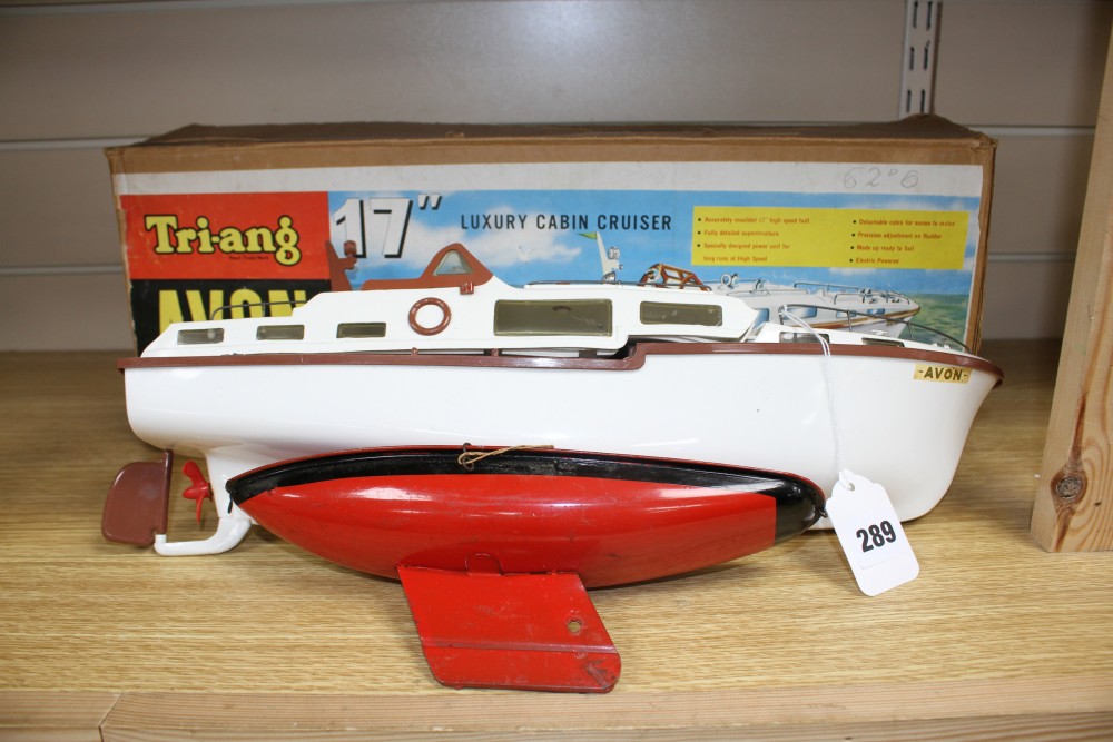 A Tri-ang Avon 17 inch electric motor luxury cabin cruiser model, boxed, together with a Tri-ang enamelled metal model of a yacht, 26.5